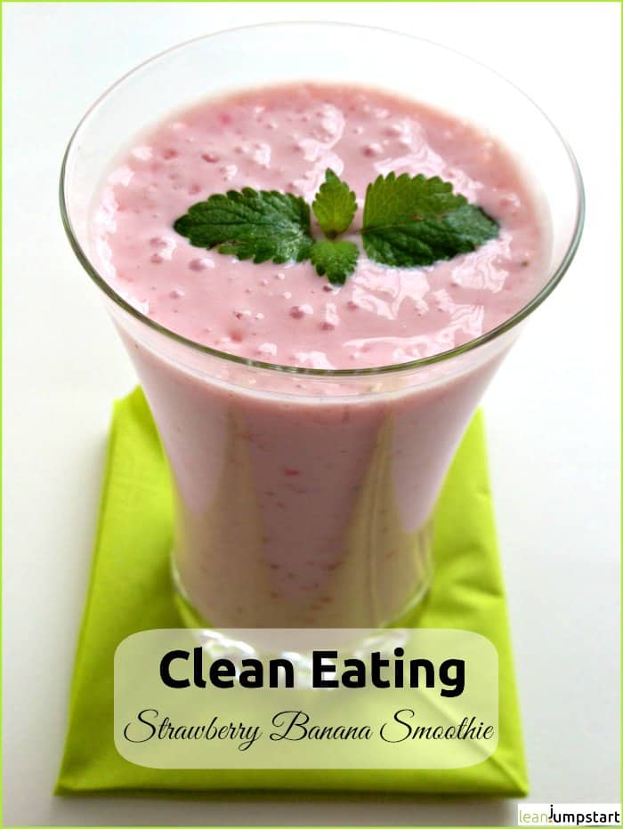 strawberry banana smoothie in a glass with text overlay 