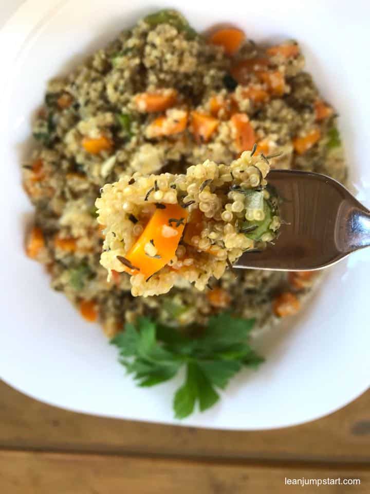 quinotto with celery and carrots on a fork