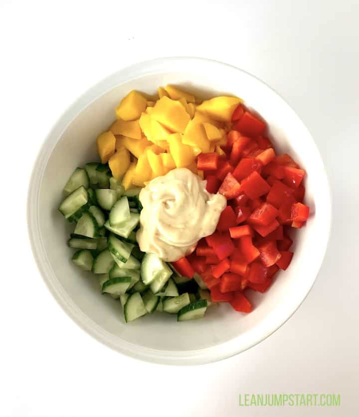 cut veggies mango with dressing