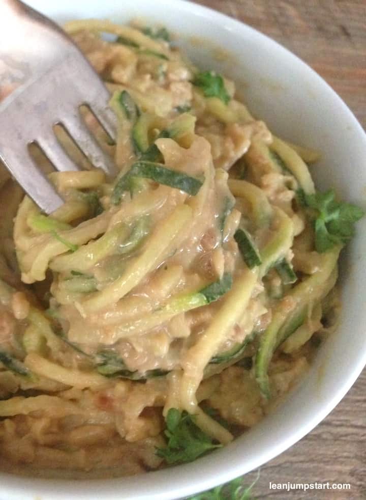 peanut butter zoodles closeup with fork