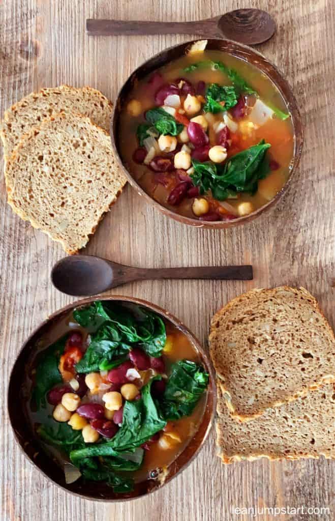 red bean soup with spinach in two wooden bowls