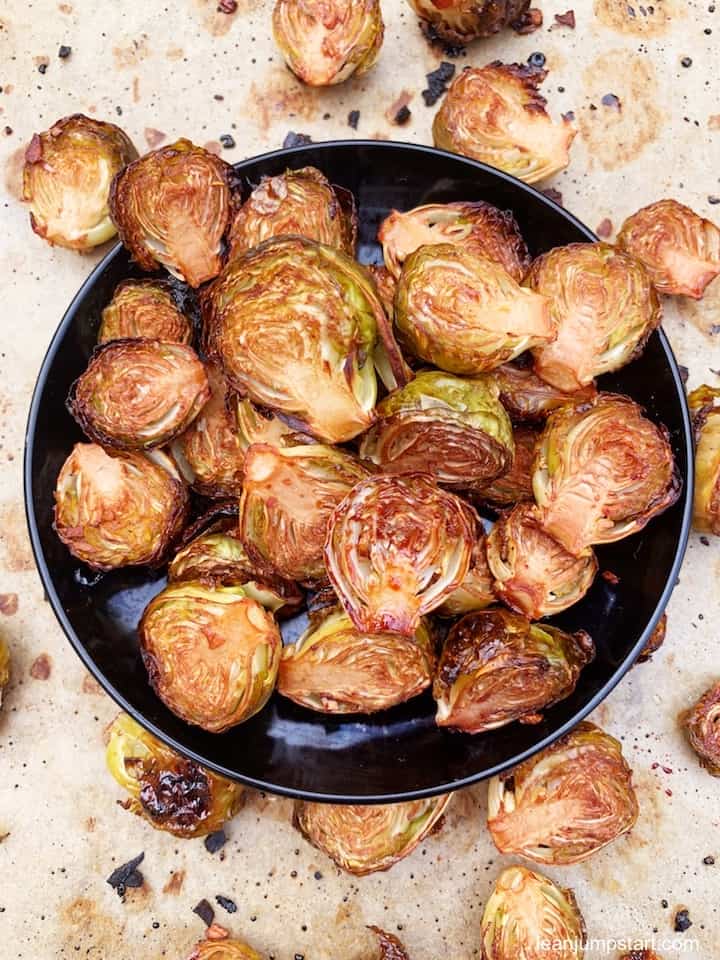 Oven Roasted brussel sprouts recipe with an irresistible bang bang sauce