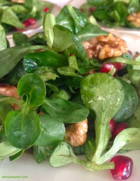 Festive lamb's lettuce salad with walnuts and pomegranate seeds