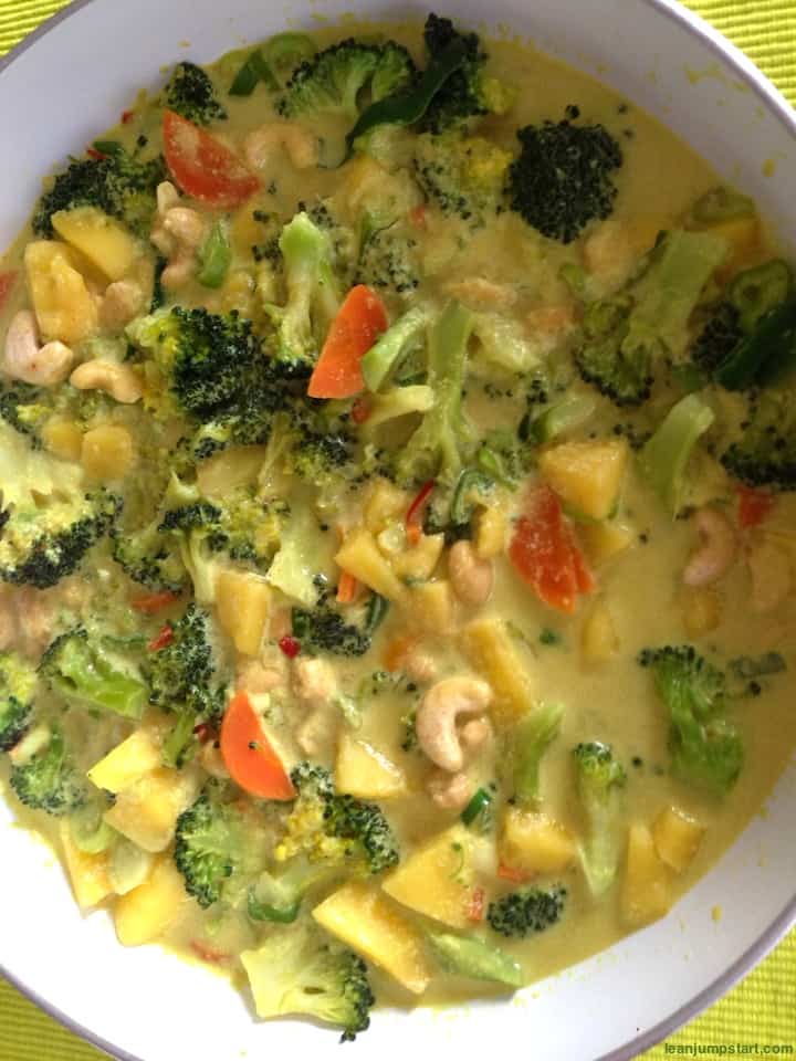 mango broccoli curry in a skillet