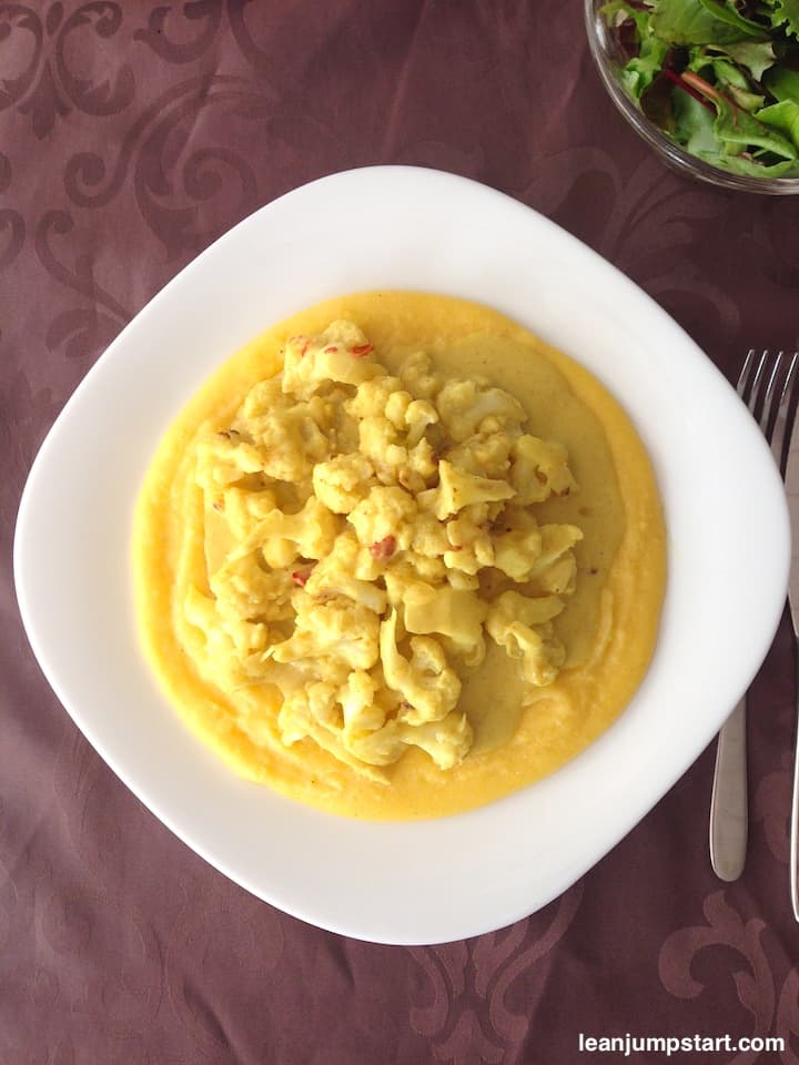 cauliflower coconut curry on a bed of polenta