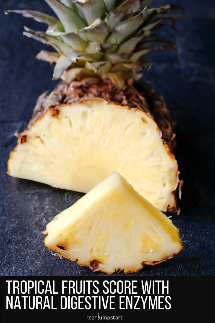 cut pineapple on dark background