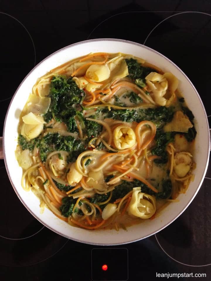 artichoke spaghetti in a pan top view