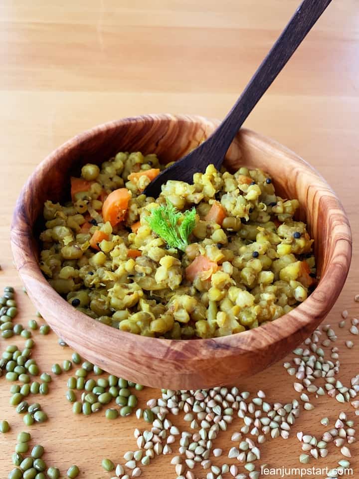 kitcharit in a wooden bowl with wooden spoon 