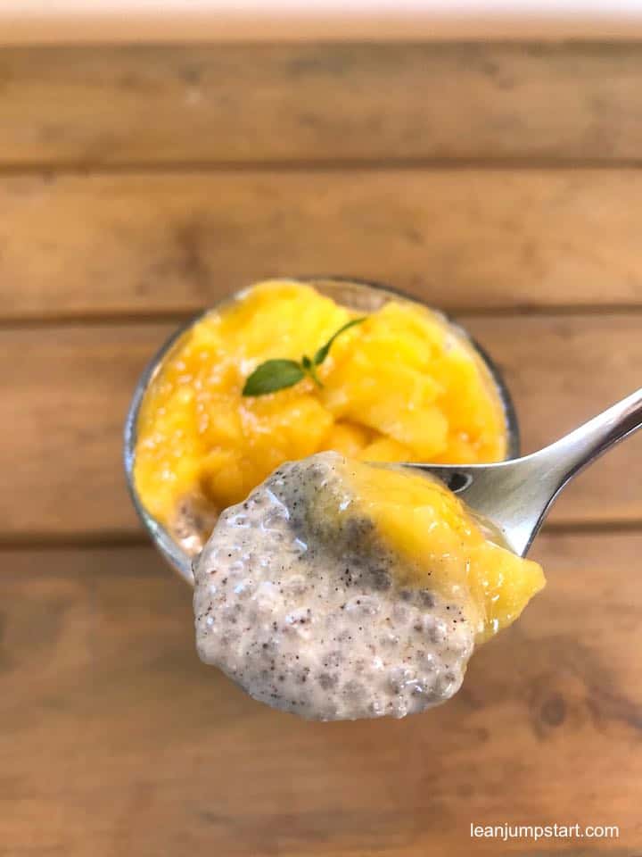 chia seed pudding with mango puree closeup