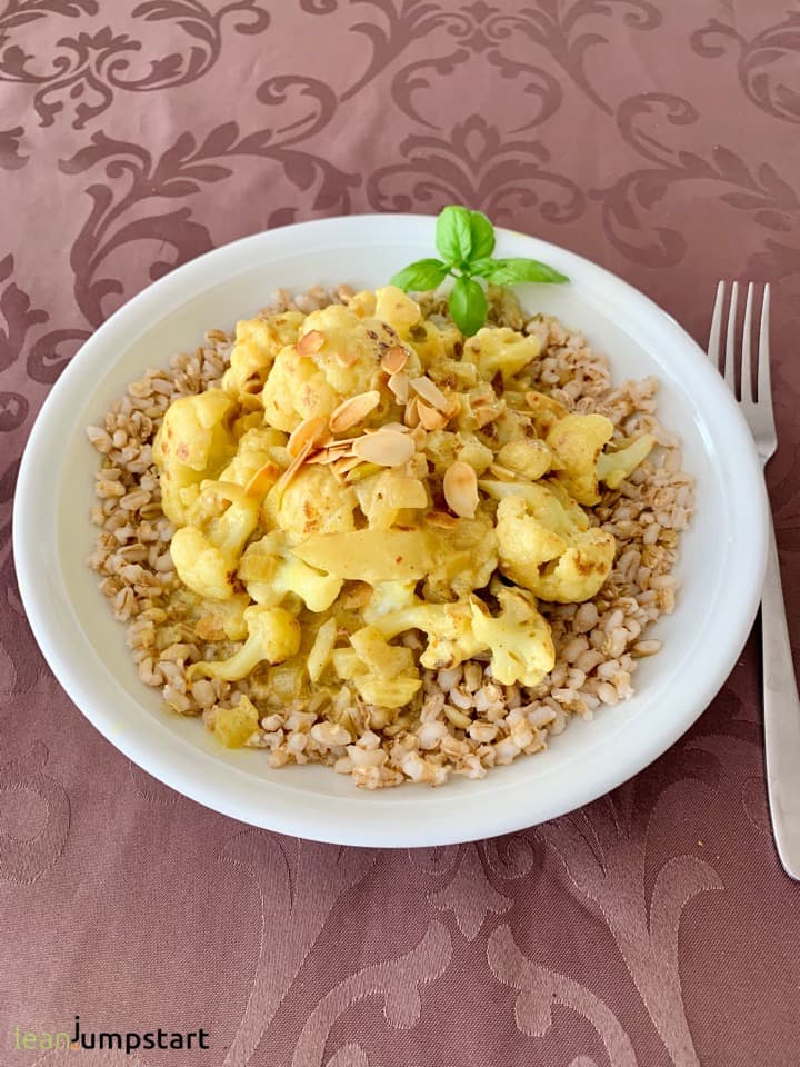 cauliflower coconut curry on a bed of grains