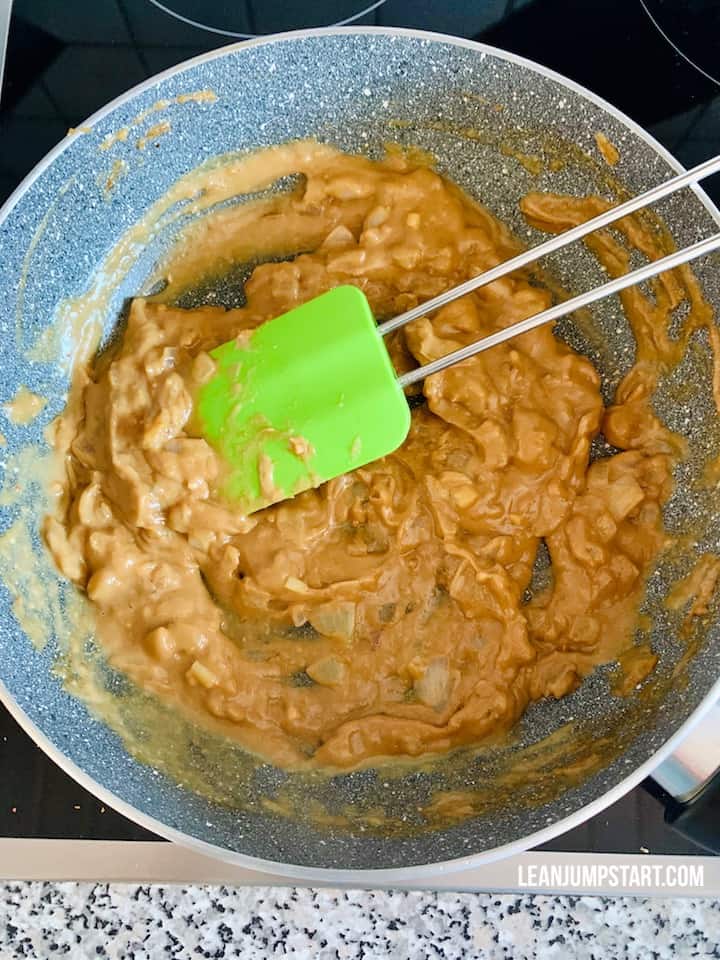creamy peanut sauce in skillet