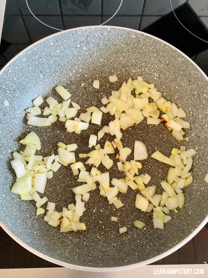 onions simmering in a skillet.